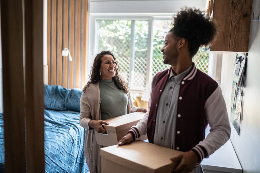 Mum helping son move into the university of derby